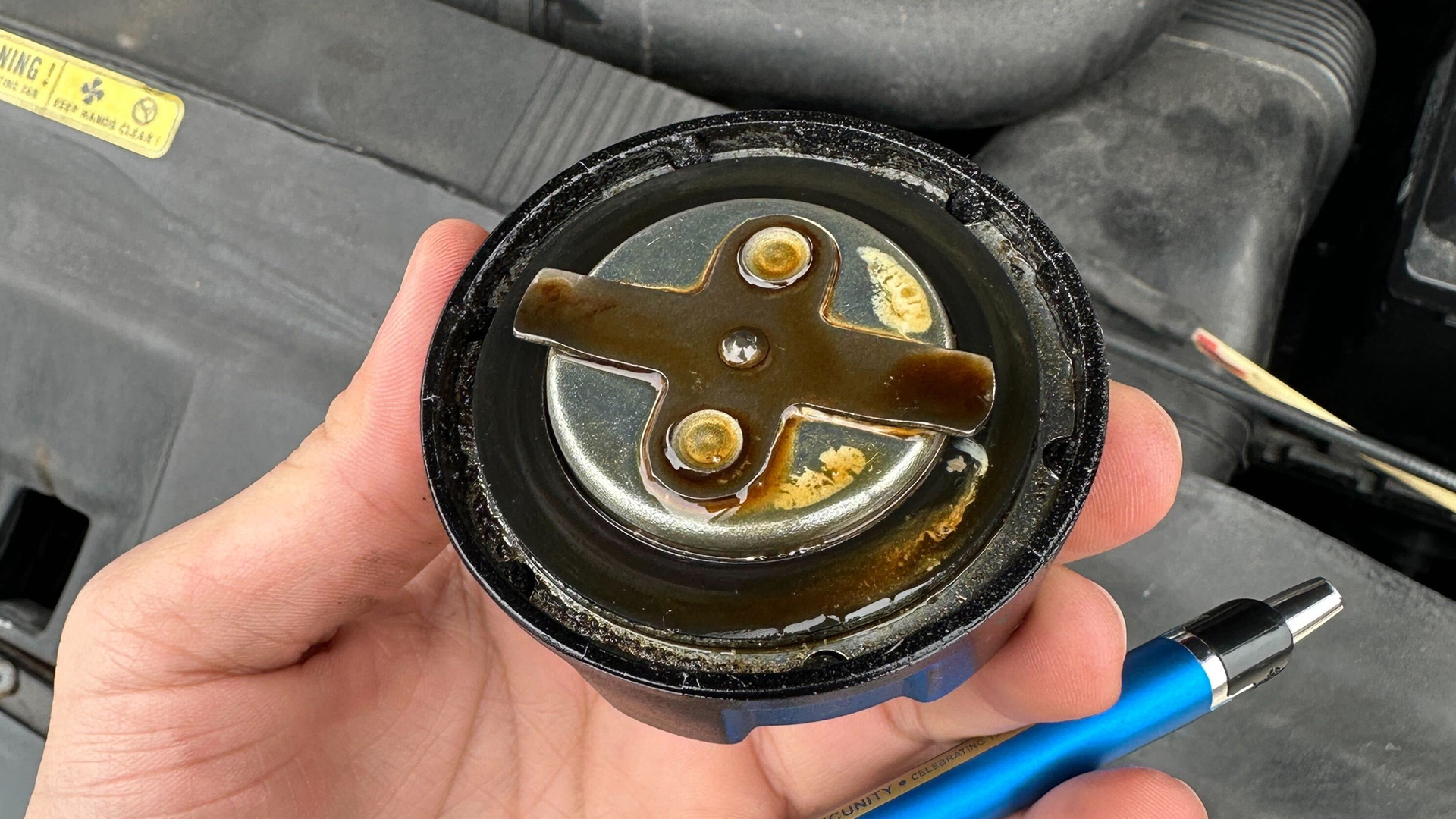 What Is The White Stuff Under Your Oil Cap The Drive