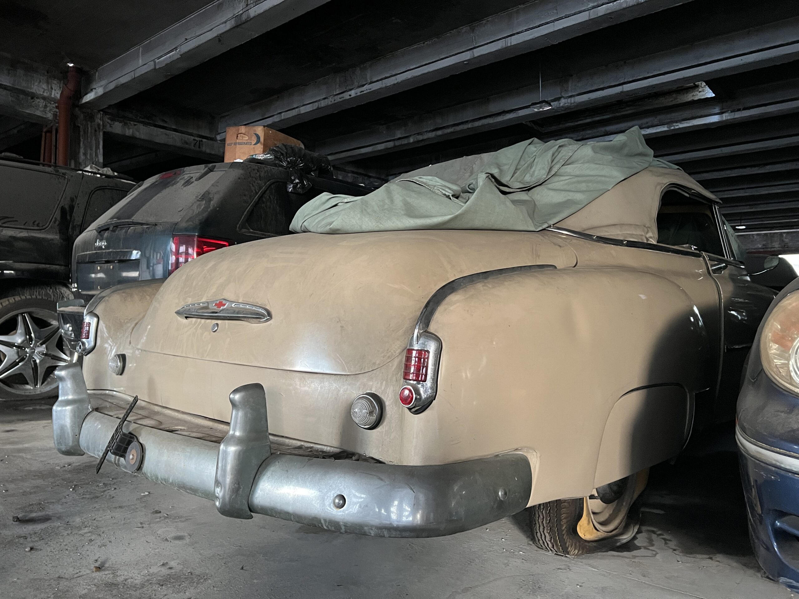 Old Car in a Garage Rug by moonfluff