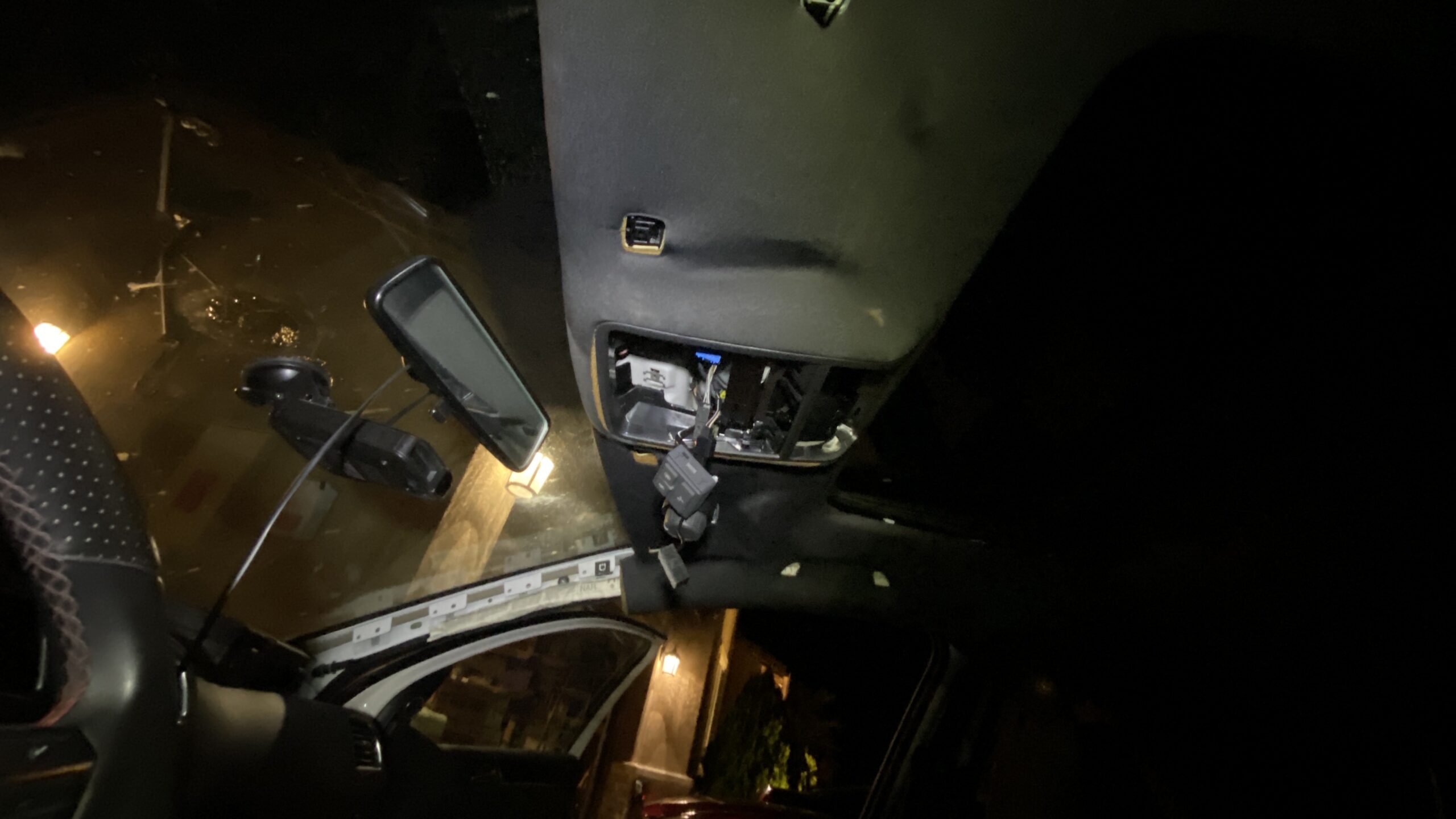 A dark image of the overhead console of a 2010 VW GTI.