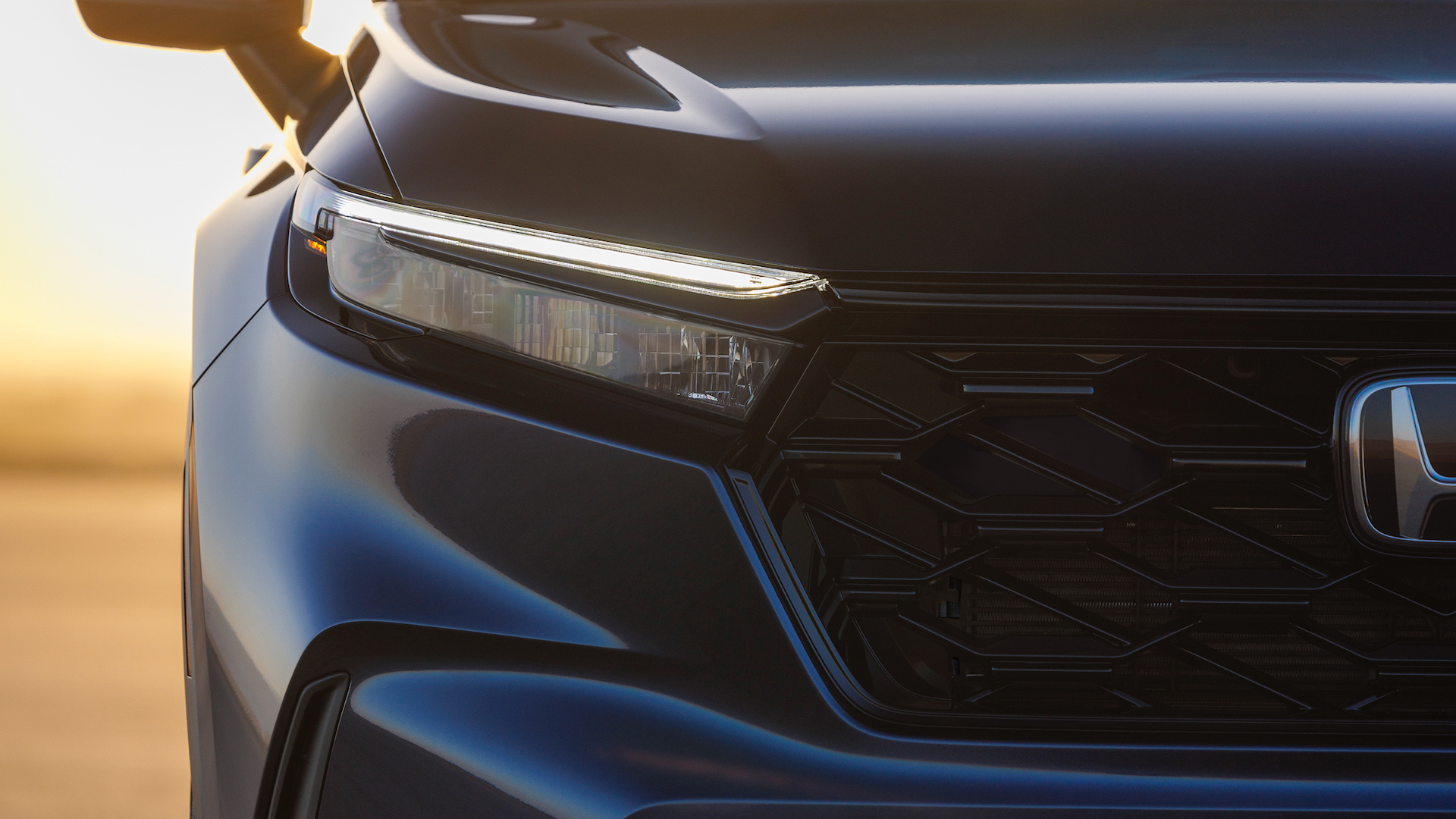 The headlight and grille of the all-new 2023 Honda CR-V.