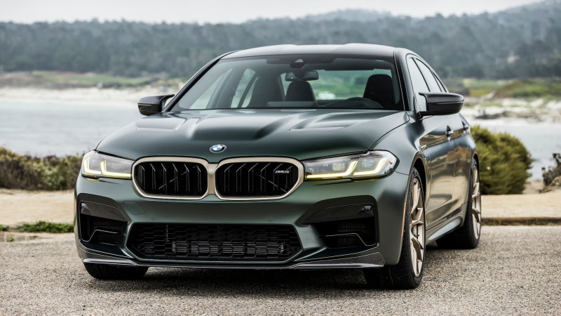 The front end of a Frozen Deep Green Metallic BMW M5 CS.