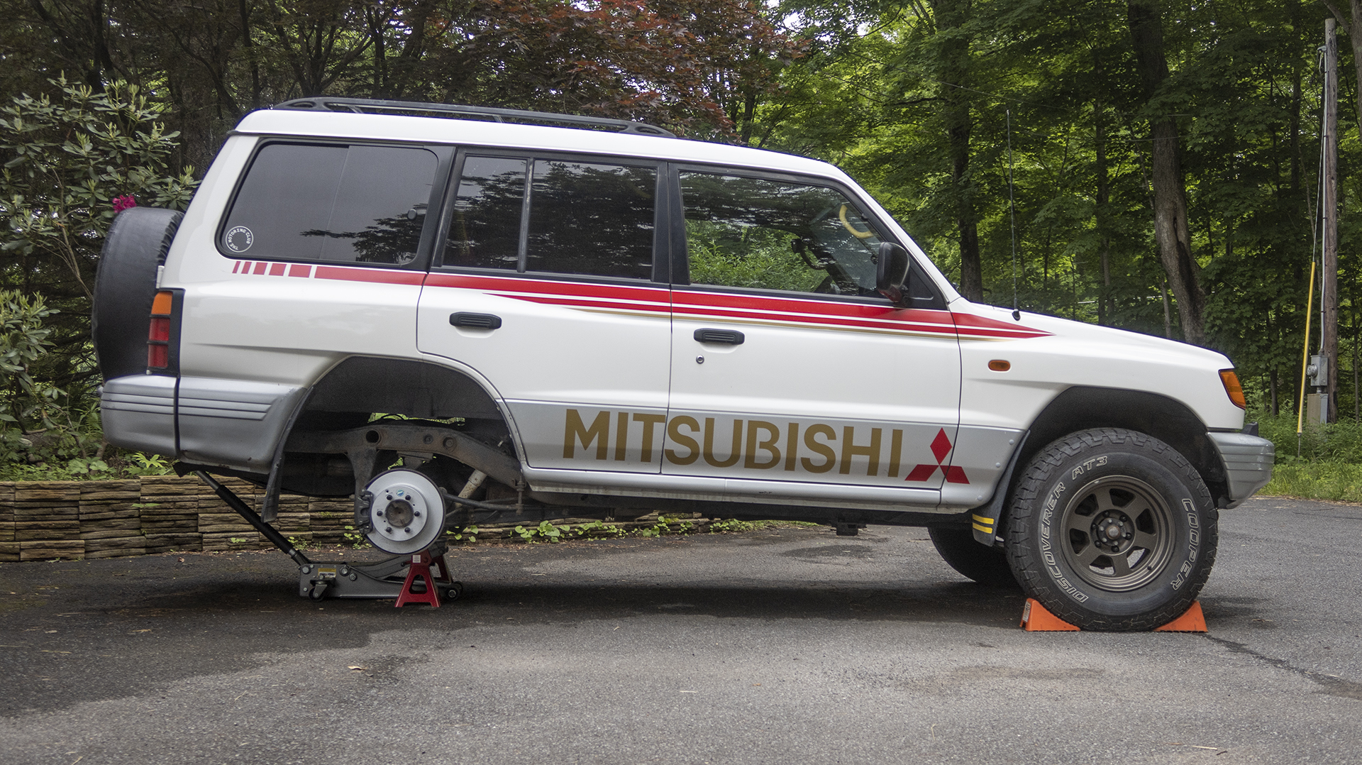 SUV on jack stands.