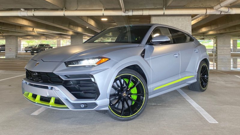 Lamborghini urus gray in parking deck