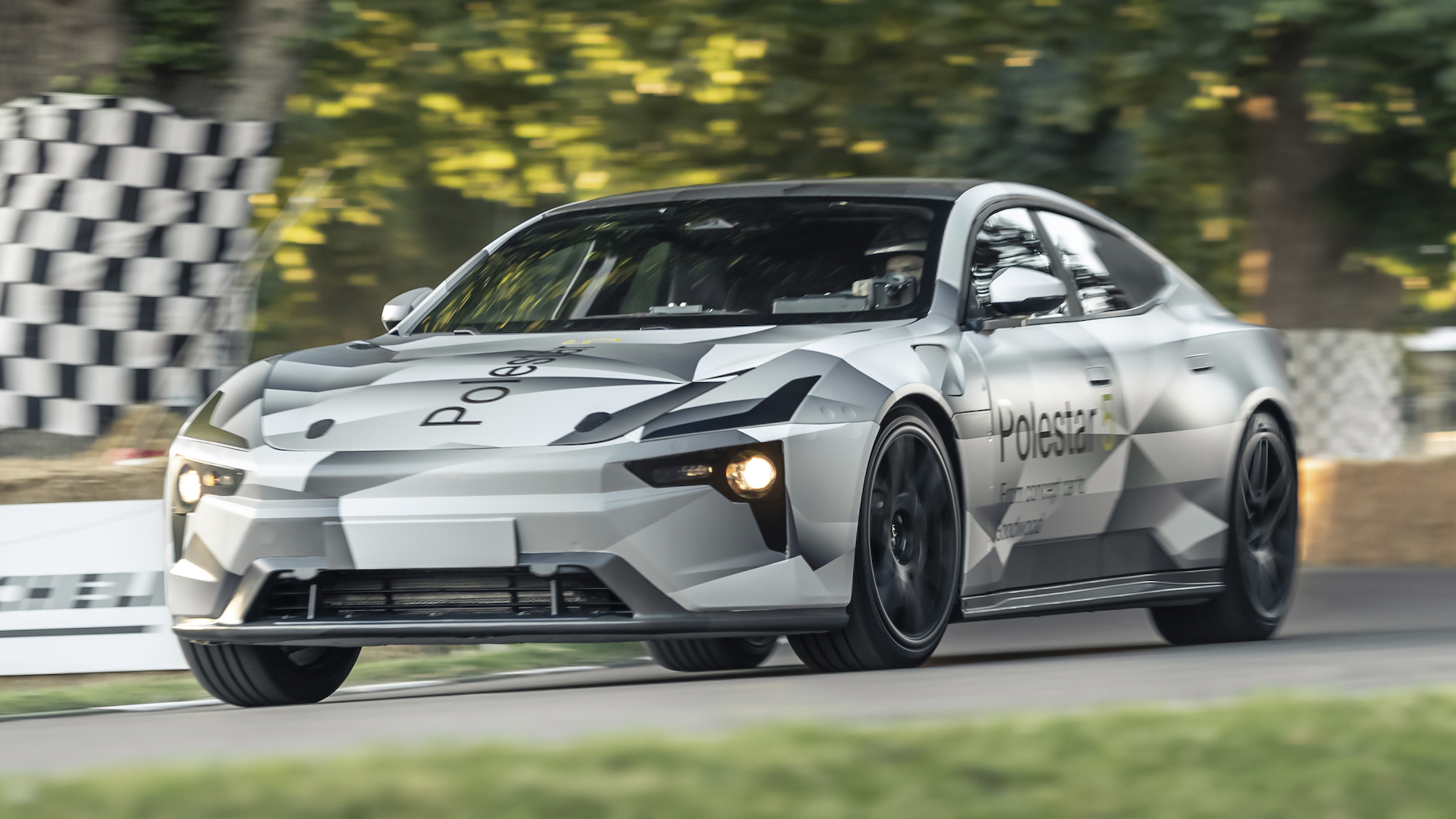 Front 3/4 view of a camouflaged Polestar 5 at Goodwood.