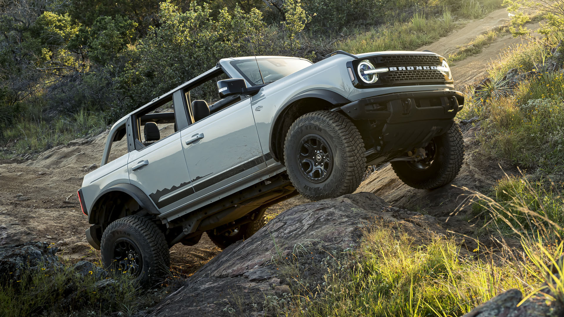 A Ford Bronco climbing an incline.