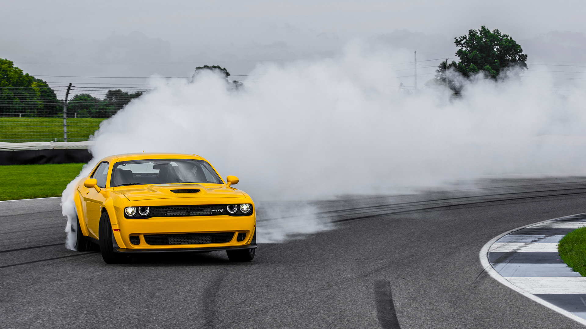 A Dodge Challenger drifting.