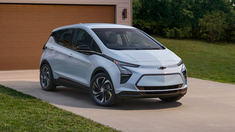 A 2023 Chevrolet Bolt in a driveway.