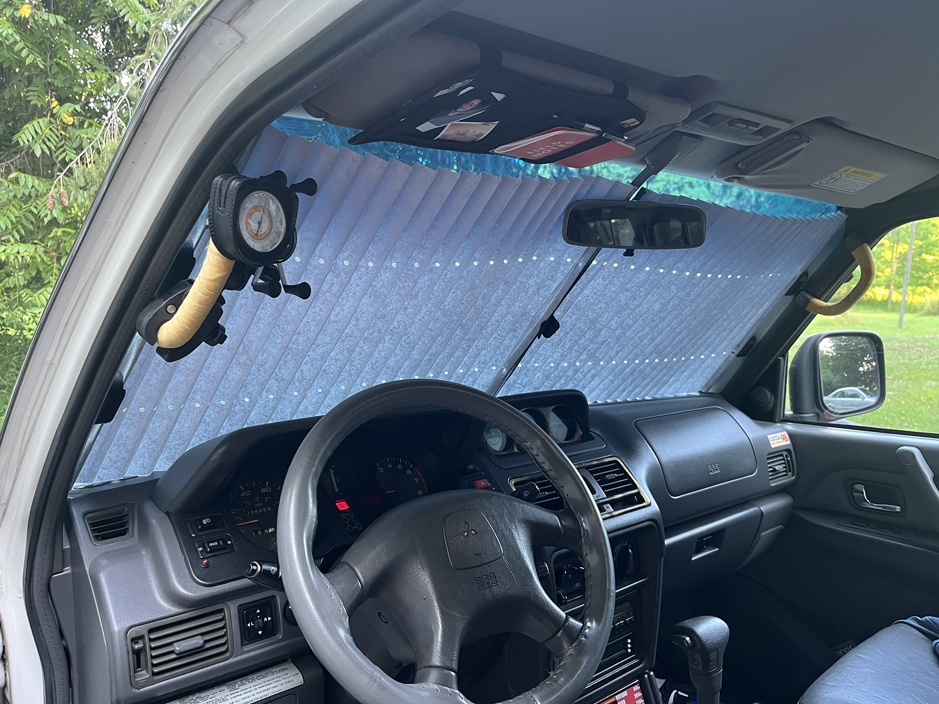 Eclipse sunshade in a Mitsubishi Montero.