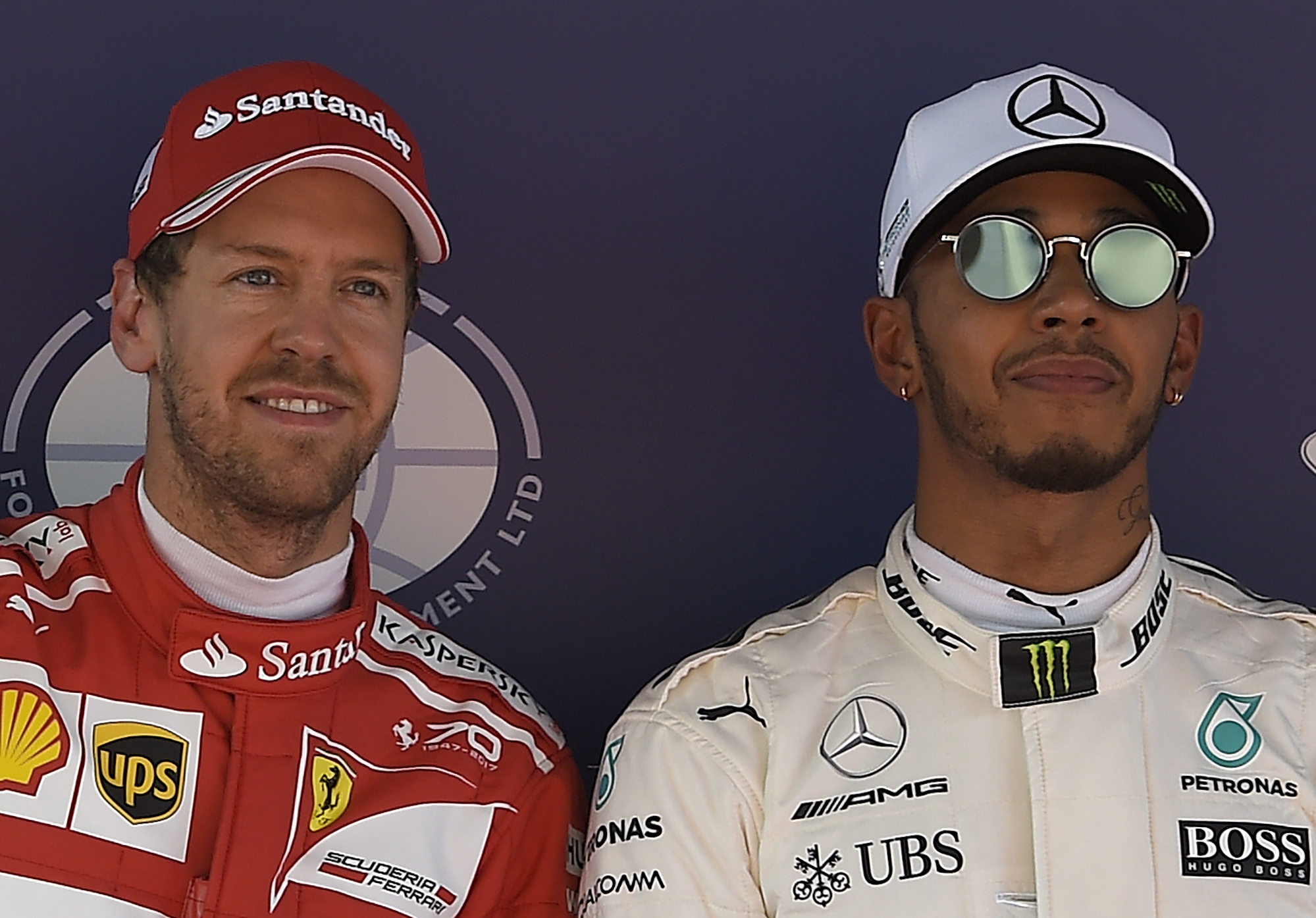 Sebastian Vettel in his Ferrari era, alongside Lewis Hamilton