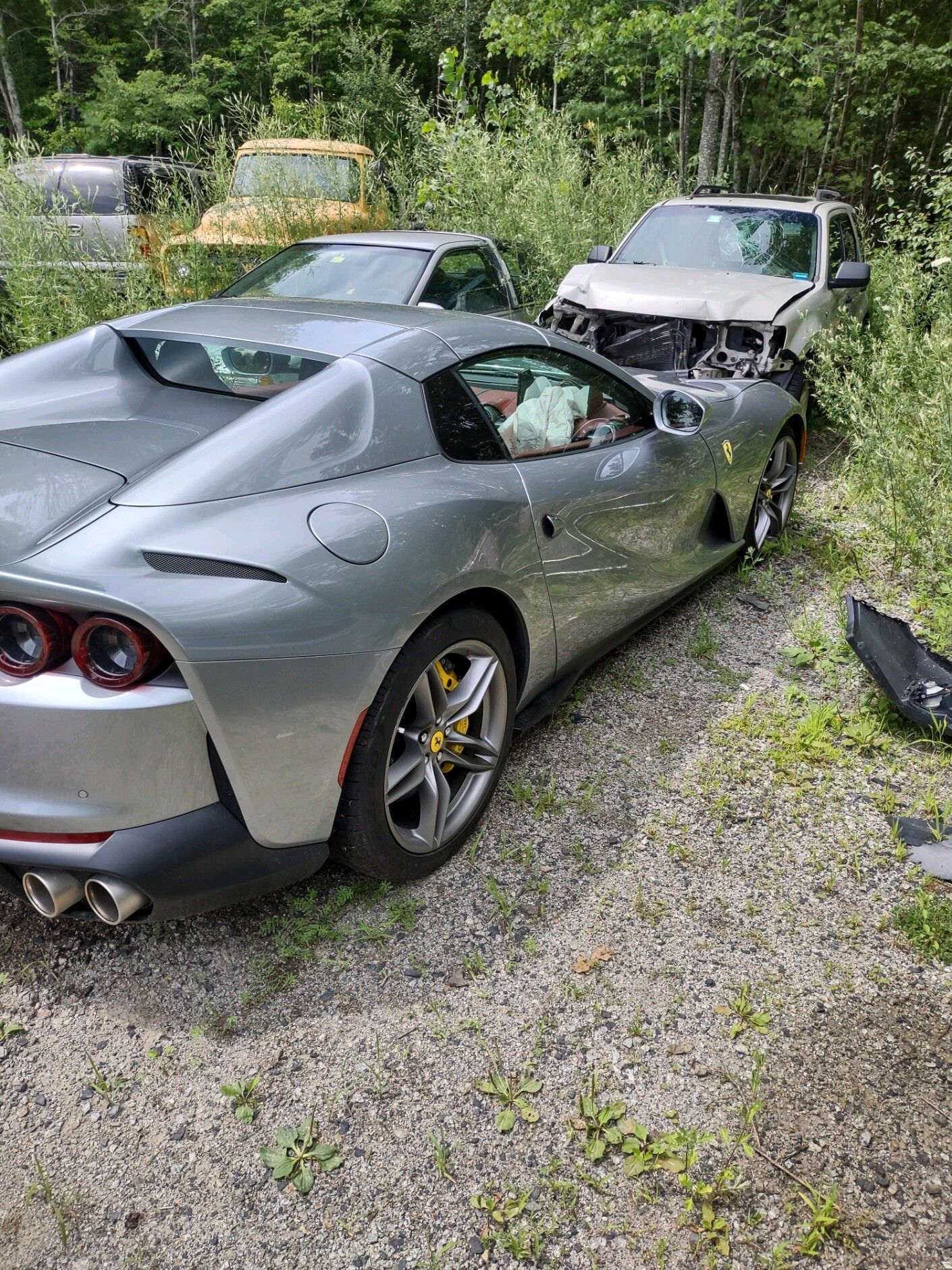 Crashed Ferrari 812 in York police impound lot.