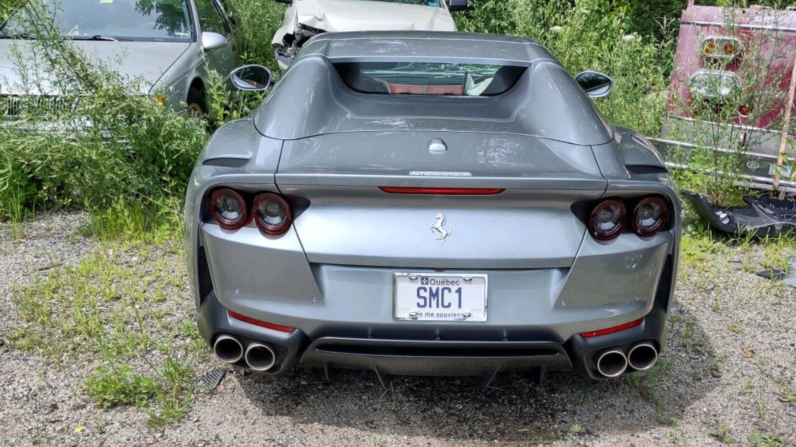 Crashed Ferrari 812 in York police impound lot.