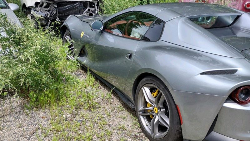 Crashed Ferrari 812 in York police impound lot.