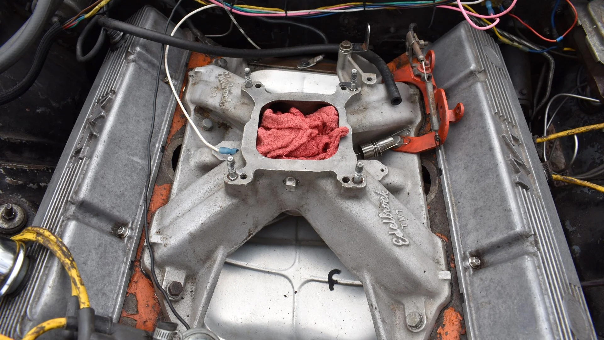 An open manifold after the carb was removed.