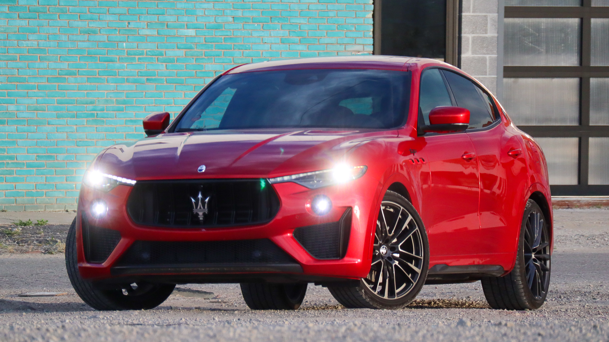 Maserati Levante Trofeo Parked Near Garage and Blue background in Detroit Michigan