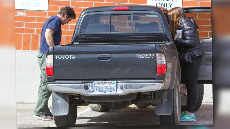 Christian Bale with his used Toyota Tacoma