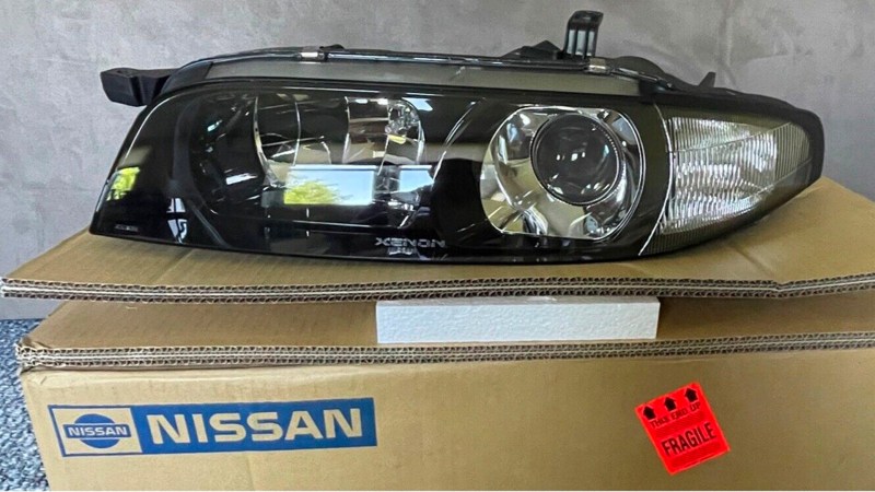 Nissan GT-R headlights on a cardboard box.