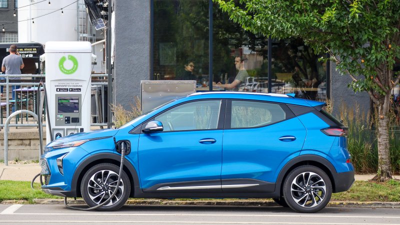 A Chevrolet Bolt EUV at a charging station.