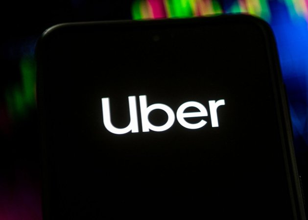 Uber Logo on a Phone Hero