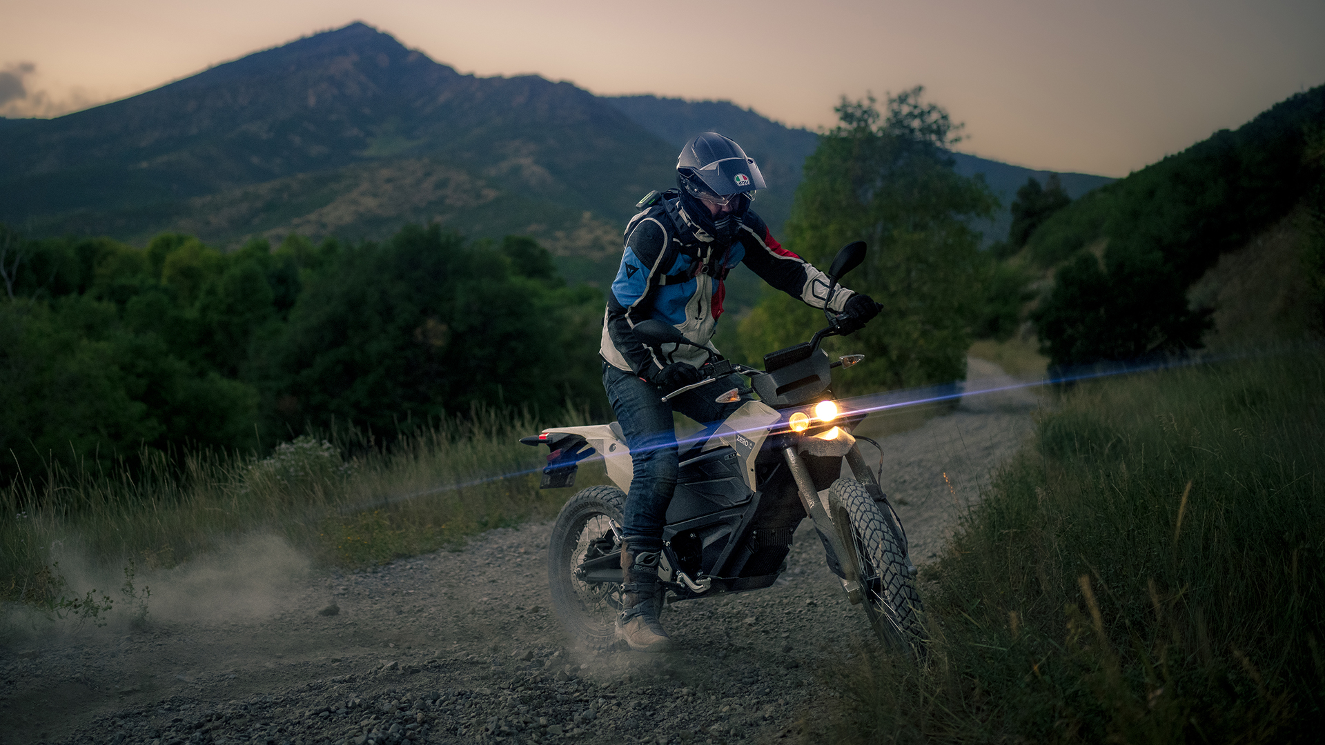 A person riding an electric motorcycle in the Utah mountains.