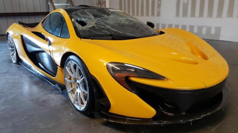 Flood-damaged 2015 McLaren P1 in yellow