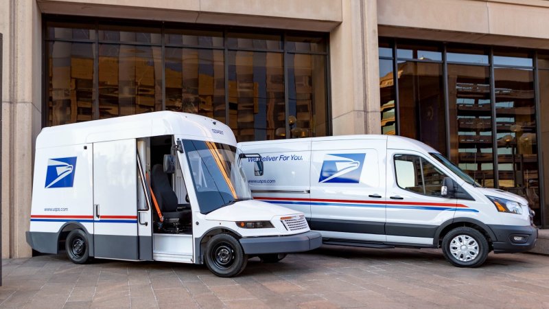 USPS NGDV next to a Ford Transit van