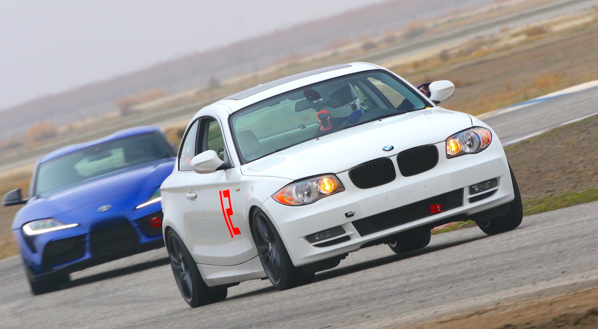 bmw 128i toyota supra on track e82 buttonwillow