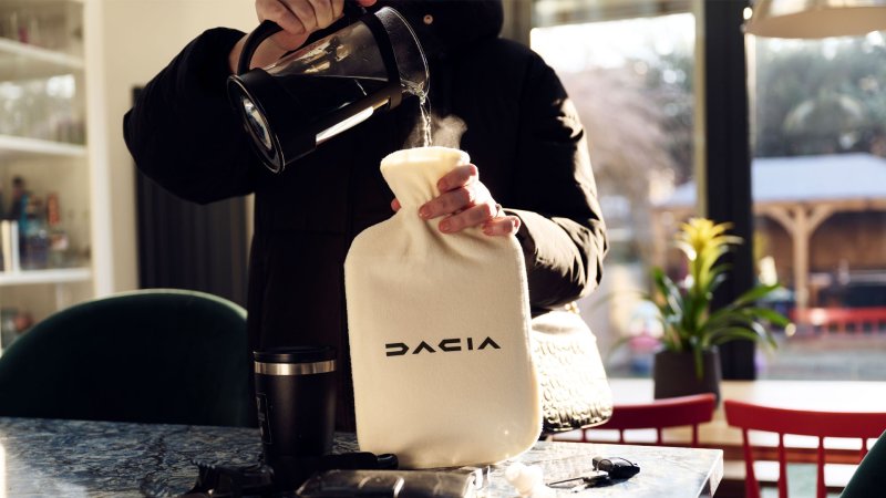 Dacia Mocks BMW’s Heated Seat Subscriptions With Free Hot Water Bottles