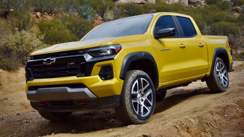 2023 Chevrolet Colorado Z71 in yellow on a dirt trail