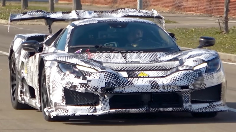 Camouflaged next-generation Ferrari hypercar hybrid on the road