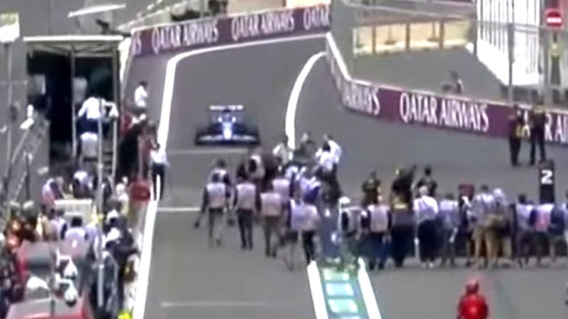 Watch Ocon Narrowly Avoid Hitting People During Chaotic Baku F1 Pit Stop