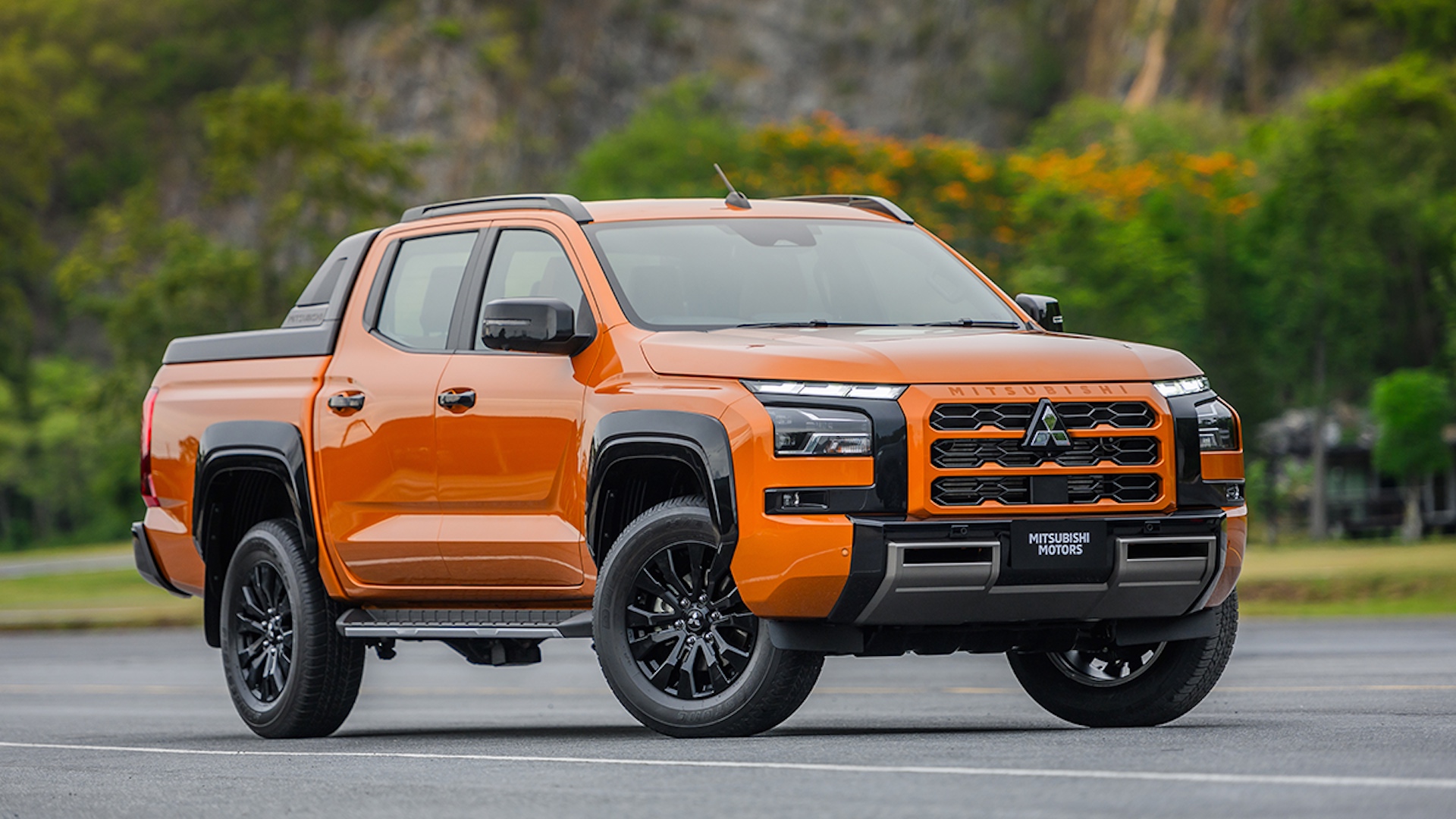 2024 Mitsubishi Triton in orange