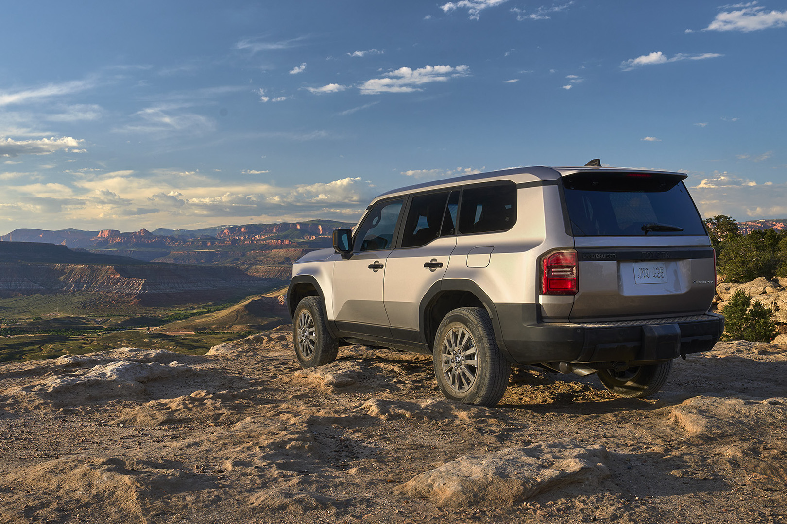 2024 Toyota Land Cruiser overlooks a desert scene