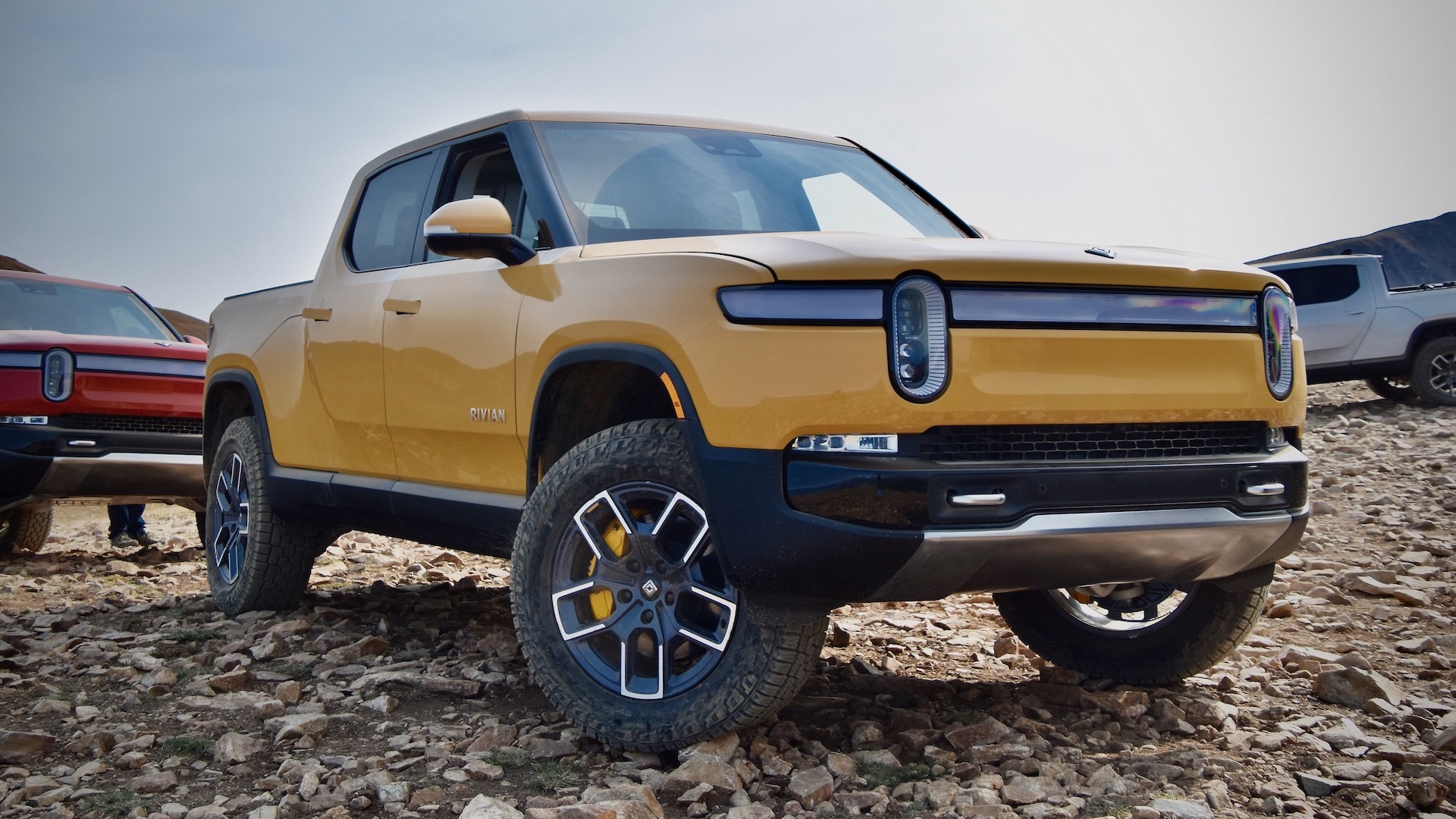 2022 Rivian R1Ts on a mountaintop