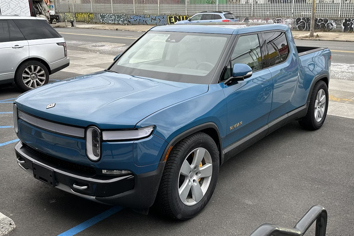 Rivian R1T pickup truck on factory Ram wheels