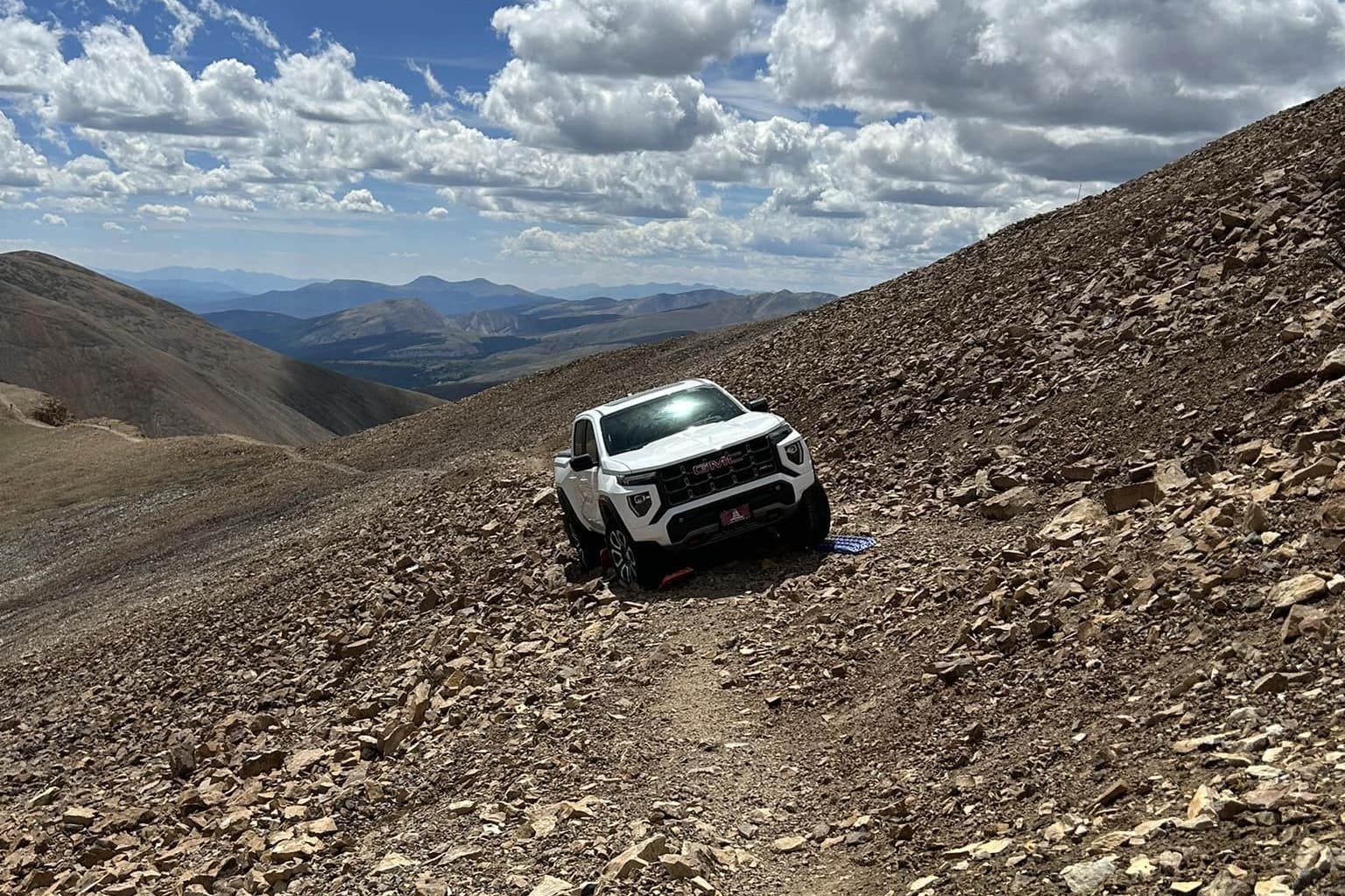 A 2023 GMC Canyon AT4 stuck on a hiking trail in Colorado