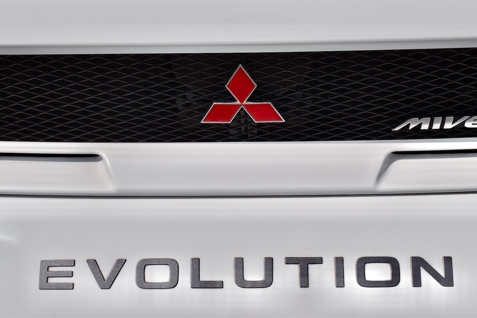 1997 Mitsubishi Pajero Evolution badging on the front bumper