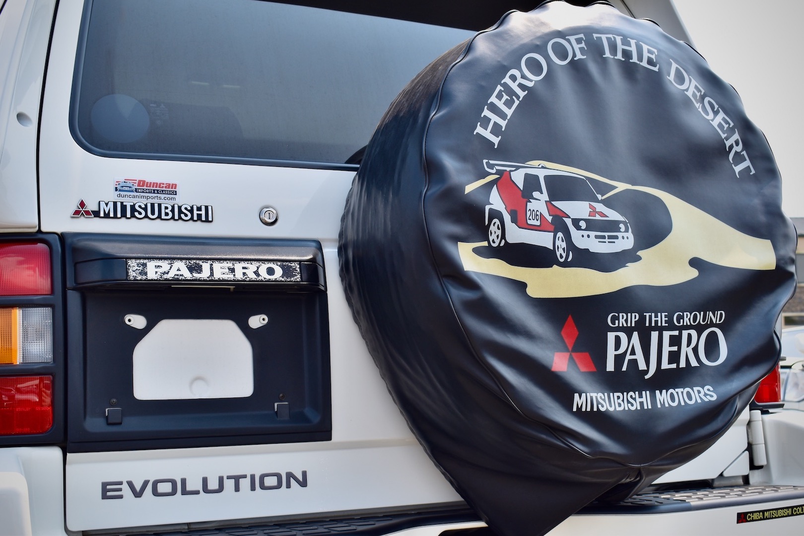 1997 Mitsubishi Pajero Evolution with "hero of the desert" spare wheel cover accessory