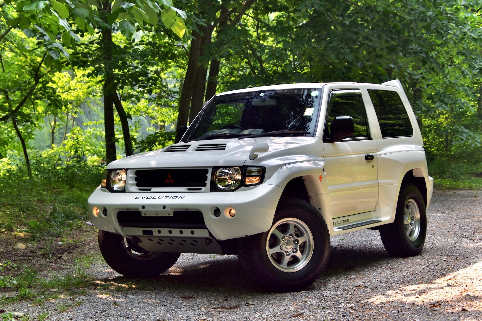 1997 Mitsubishi Pajero Evolution front three-quarter view in a wooded area