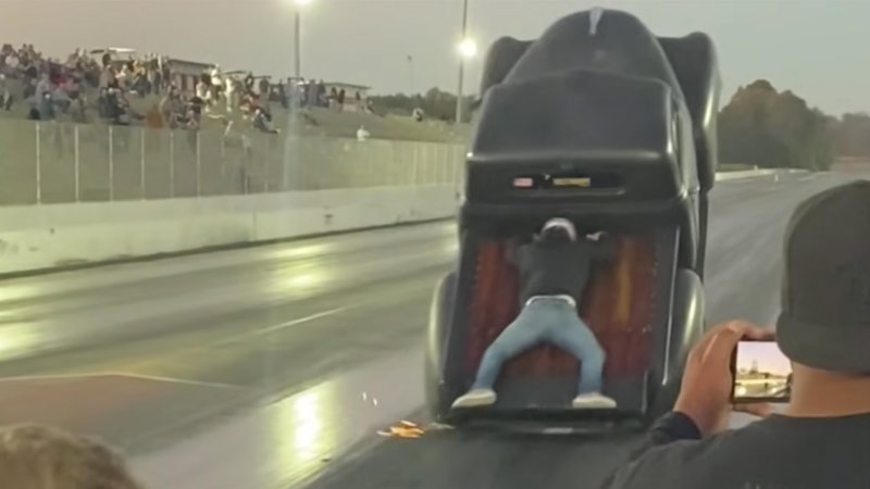 This Guy Rode In the Bed of a Drag Truck During a Pass. It Turned Into a Mess