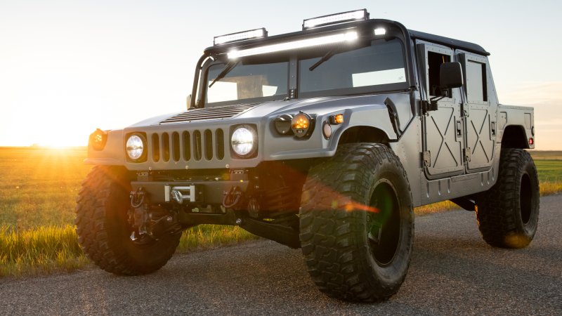 NAEV Cyber-Hummer. A Hummer H1 against a sunset background.