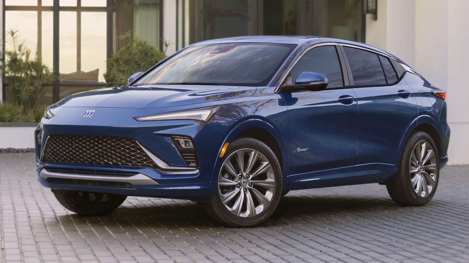 Front 3/4 view of the 2024 Buick Envista Avenir in Ocean Blue Metallic