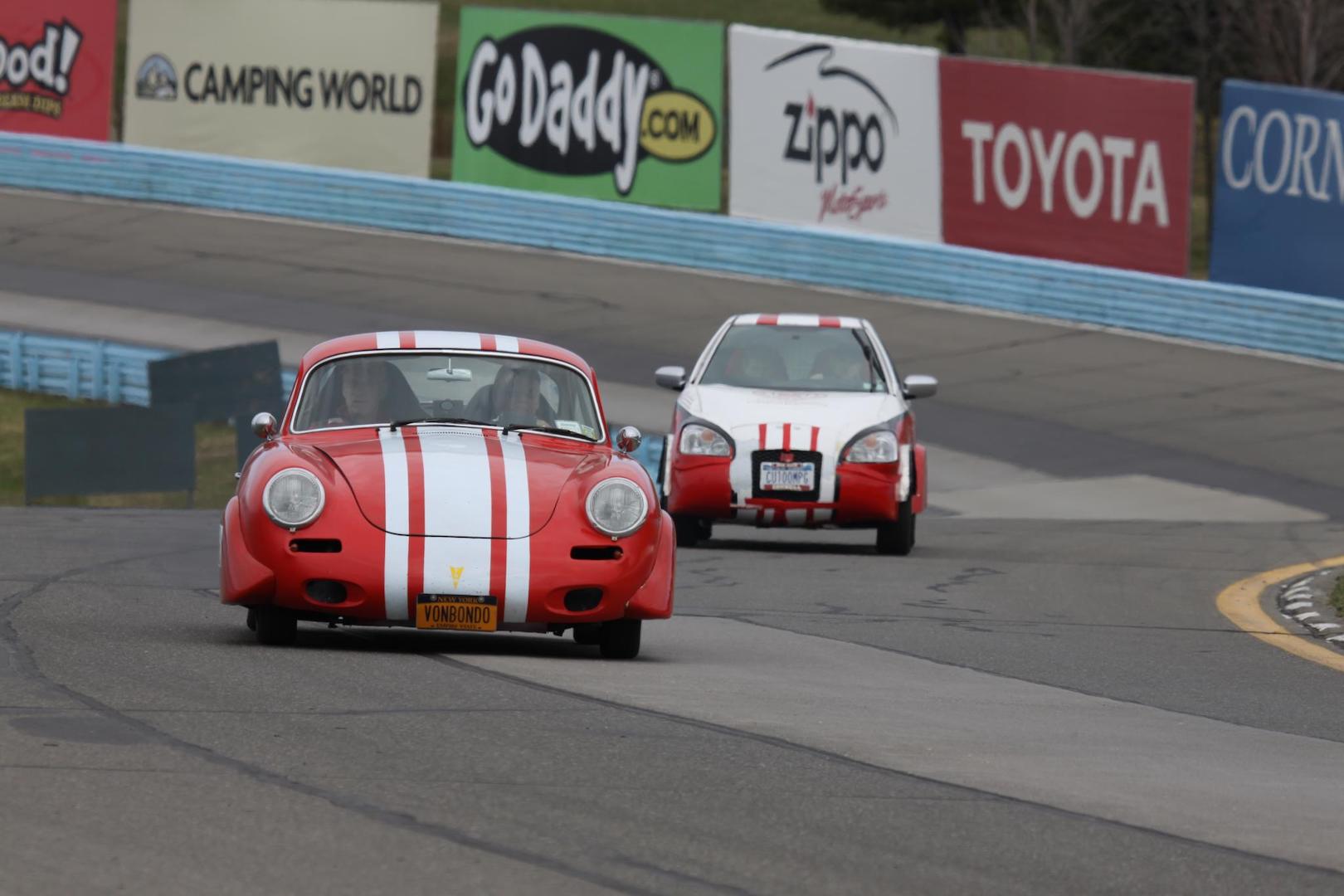 A streamlined classic Porsche traverses Watkins Glen International Raceway at the Toyota Green Grand Prix