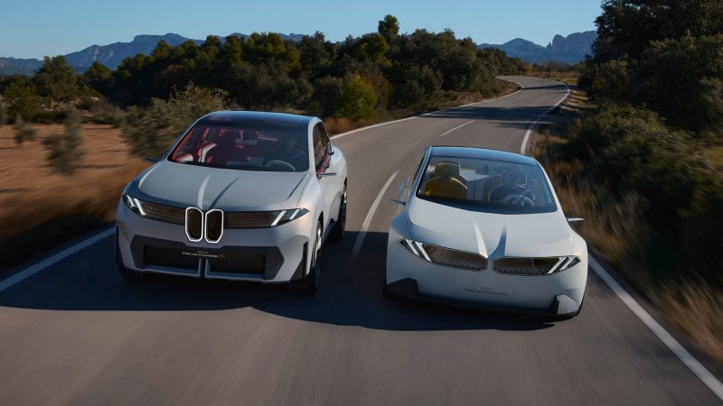 BMW Vision Neue Klasse X and Vision Neue Klasse concepts on road together.