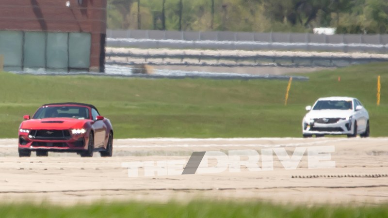 Spy Photos Catch Ford Testing Cadillac CT4-V Blackwing Against Mustang