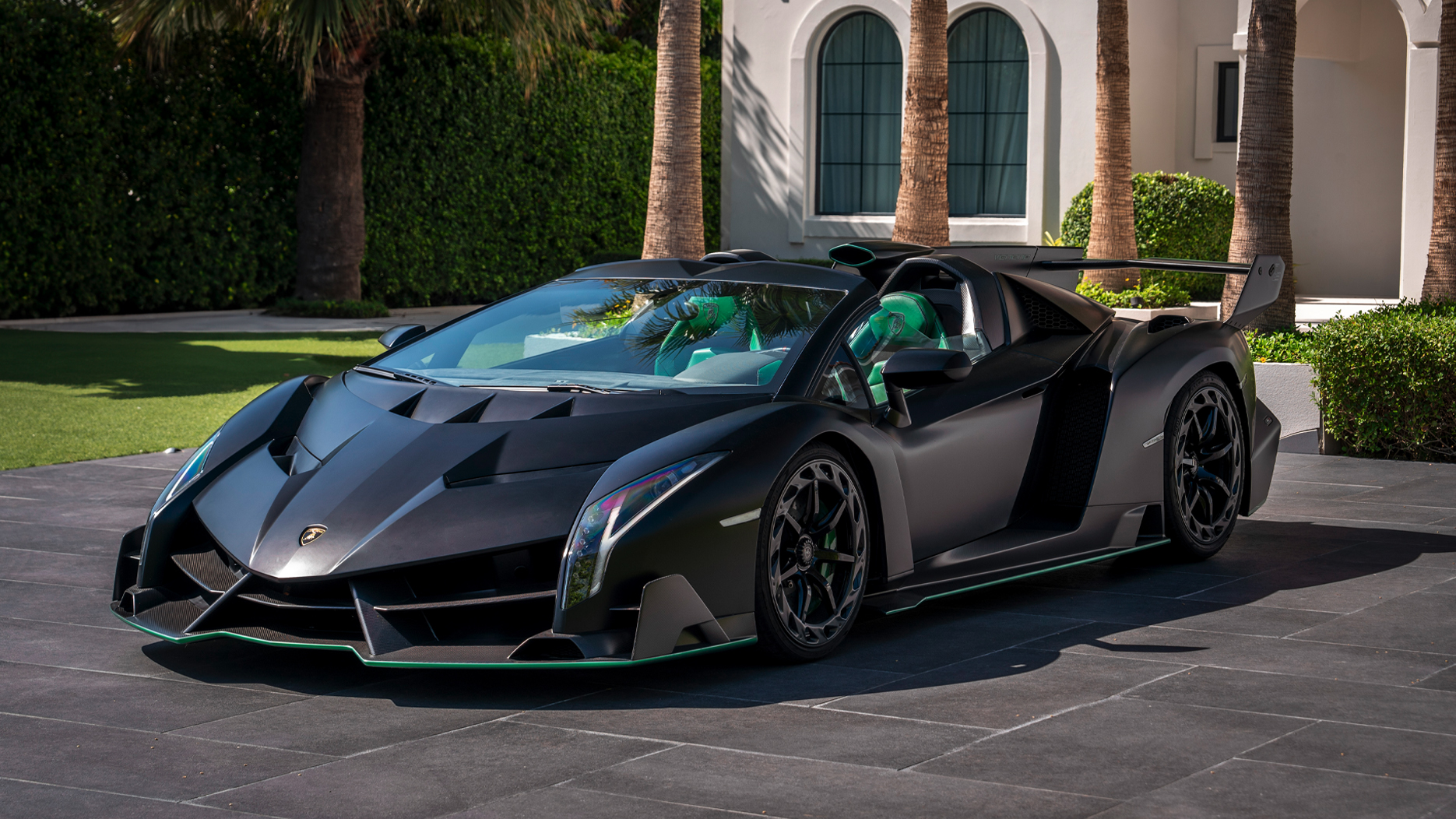 Black wedge-shaped supercar, the $6M Lamborghini Veneno Roadster