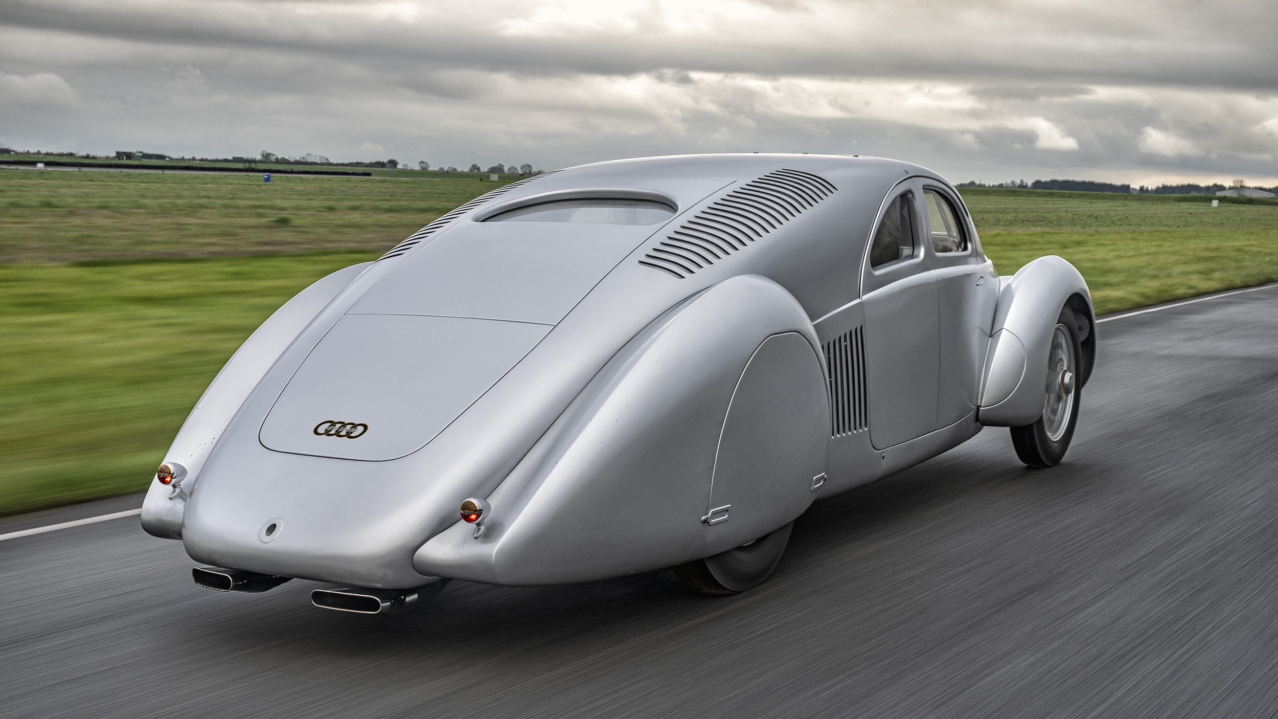 Imagined over 90 years ago, now brought to life: Audi Tradition presents the Auto Union Type 52 Schnellsportwagen at the Goodwood Festival of Speed 2024.