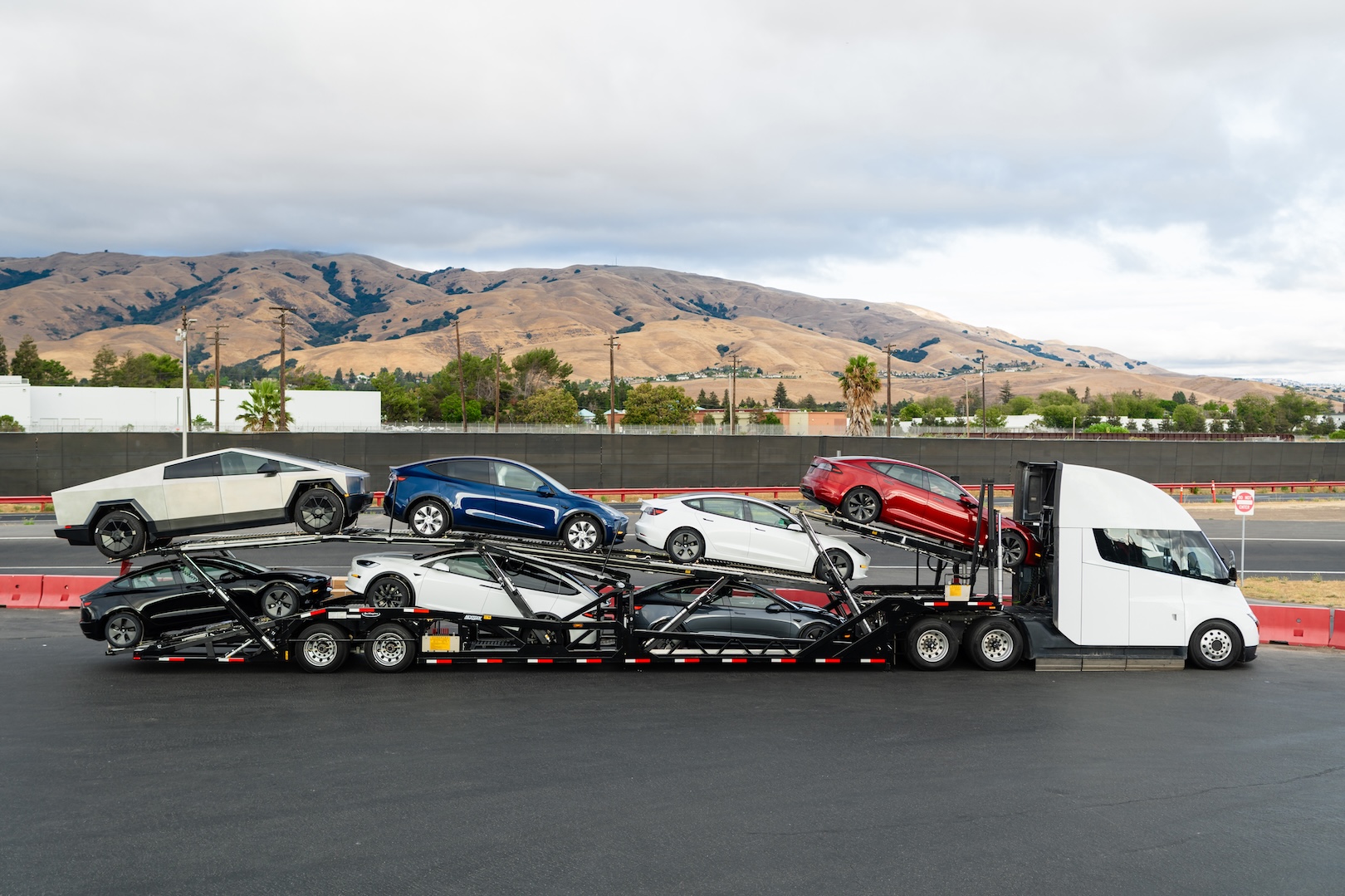 Tesla lineup on board a car carrier