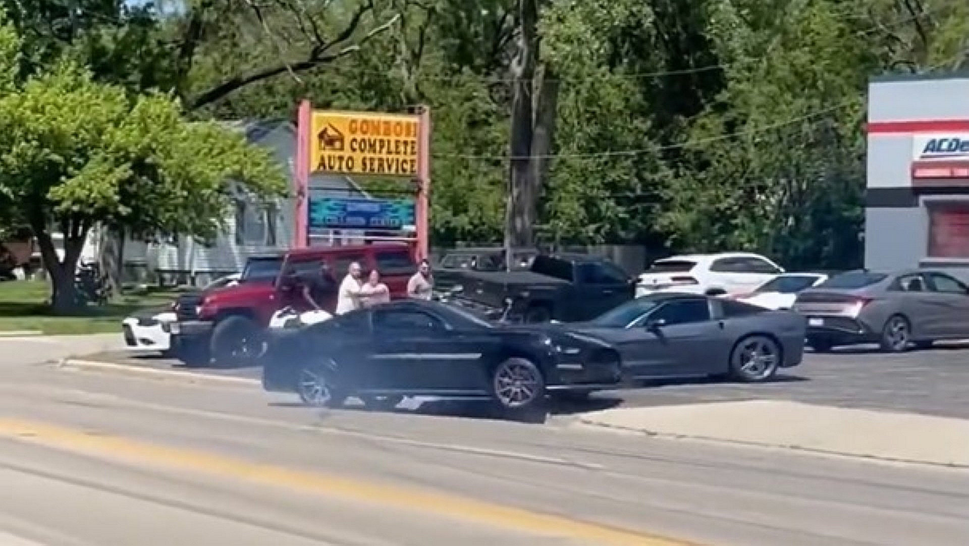 Mustang crashes into Corvette leaving car meet