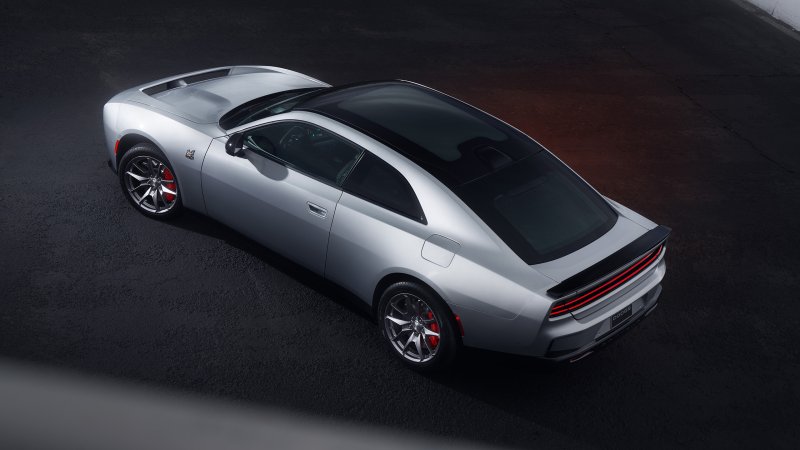 Dodge Charger Scat Pack EV viewed from rear three-quarter angle.