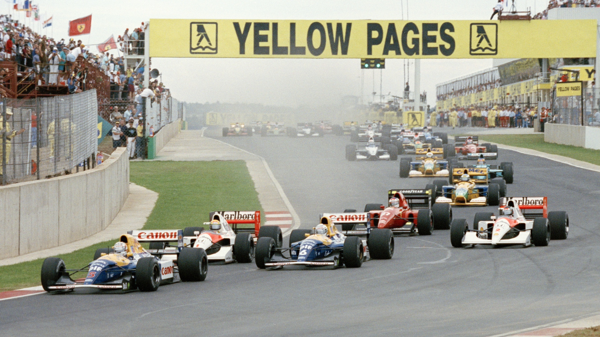 Nigel Mansell, driver of the #5 Canon Williams Renault Williams FW14B Renault 3.5 V10 leads the field at the start of the Yellow Pages South African Grand Prix on 1st March 1992 at the Kyalami Grand Prix Circuit in Kyalami, South Africa.(Photo by Pascal Rondeau/Getty Images)